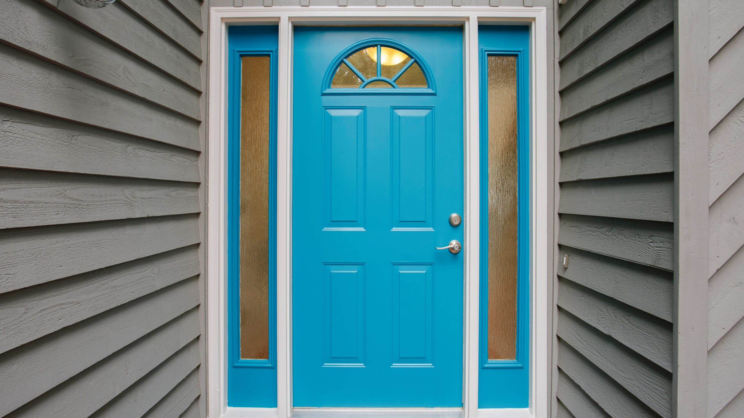 Close-up of bright blue entry door